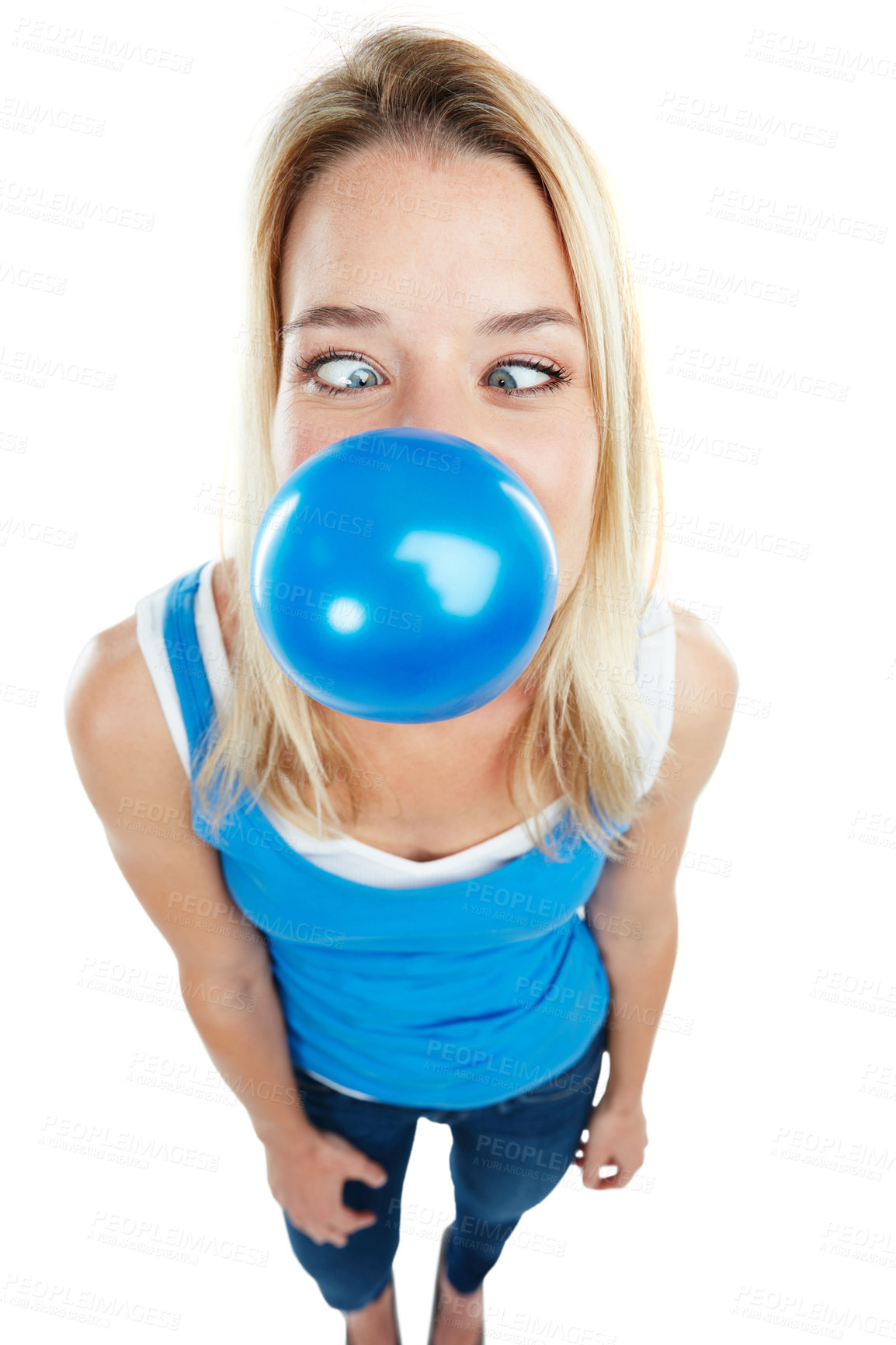 Buy stock photo Shot of a young woman blowing up a balloon against a white background