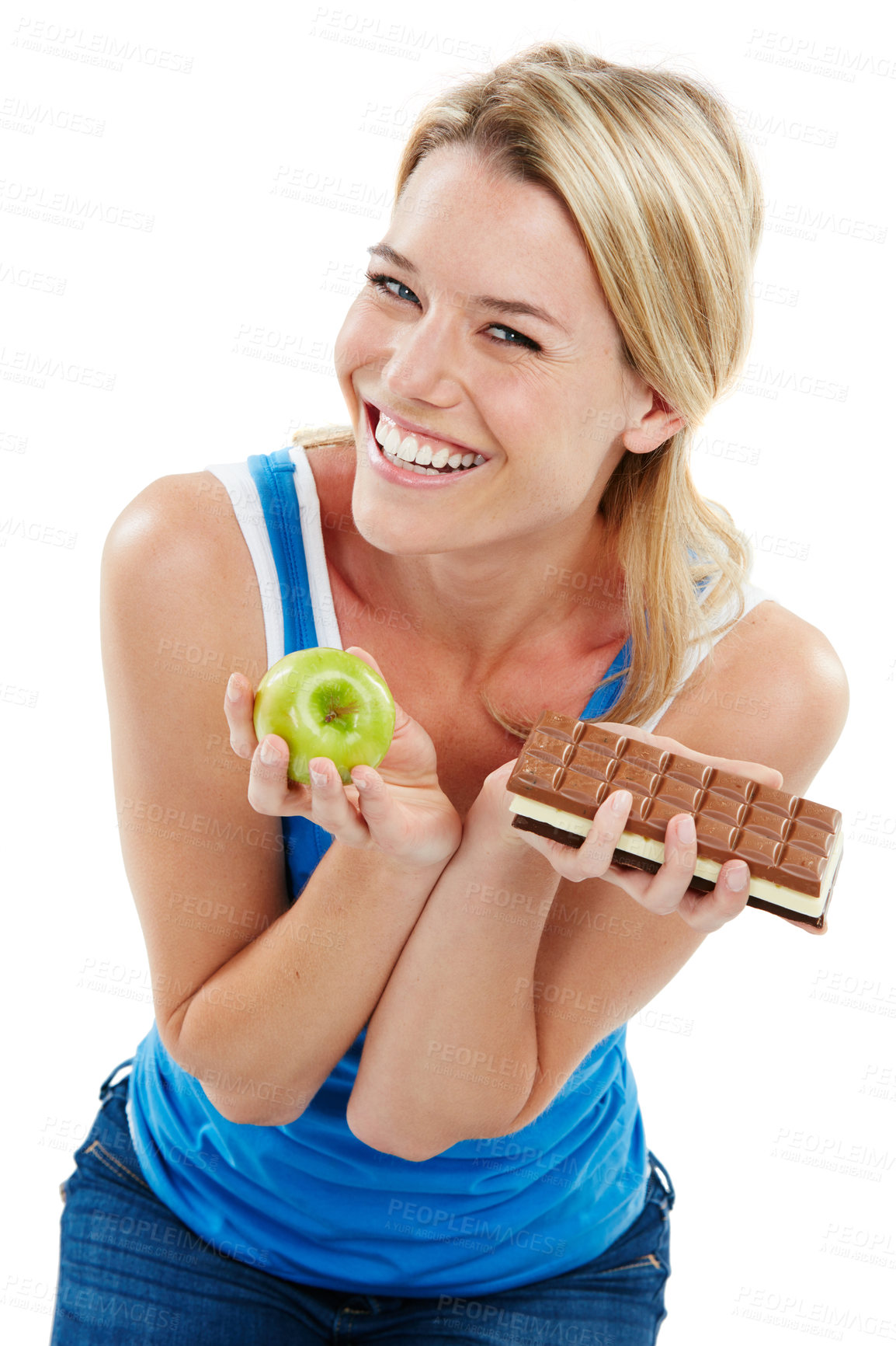 Buy stock photo Studio shot of a woman deciding between healthy and unhealthy foods