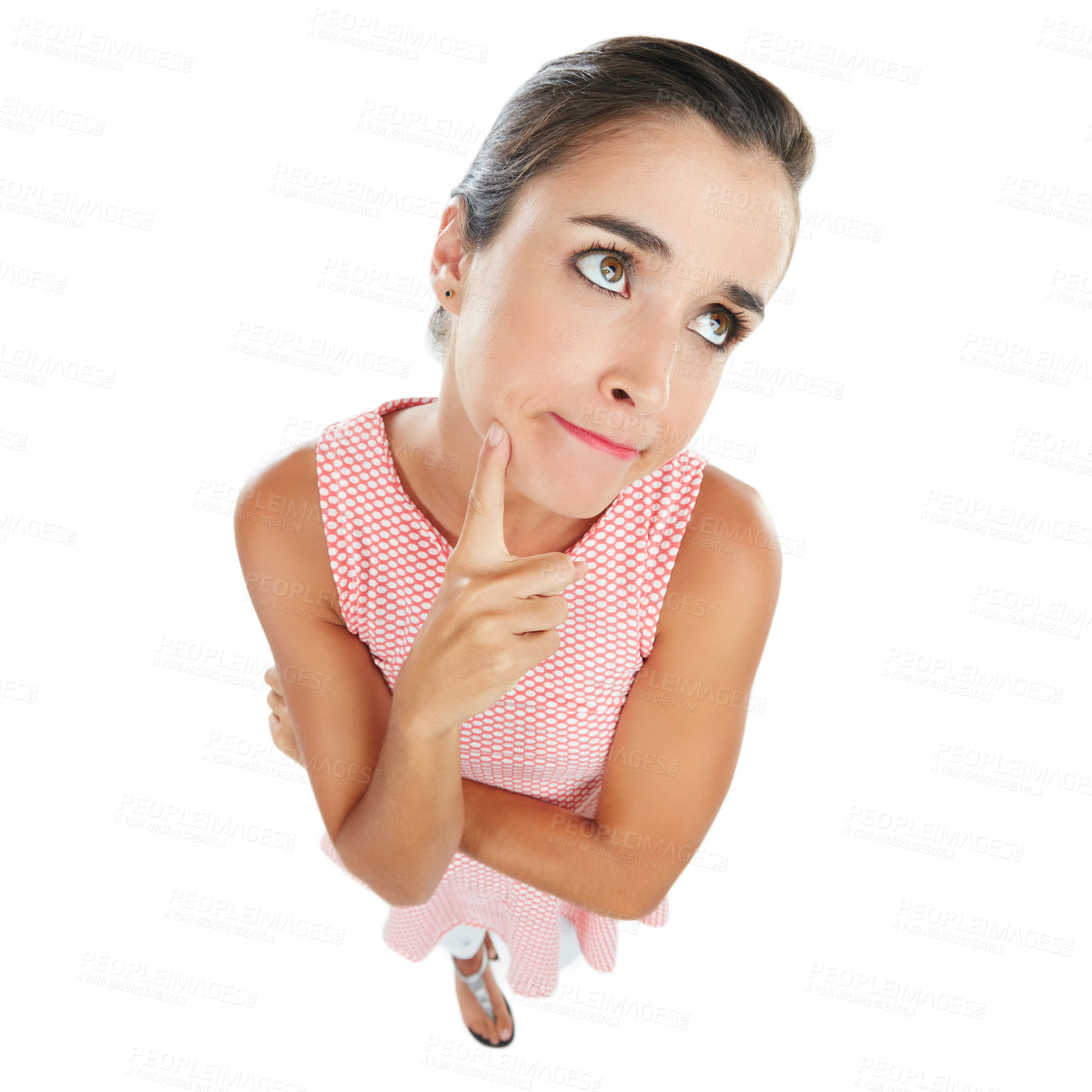 Buy stock photo High angle studio shot of a young woman looking unsure against a white background