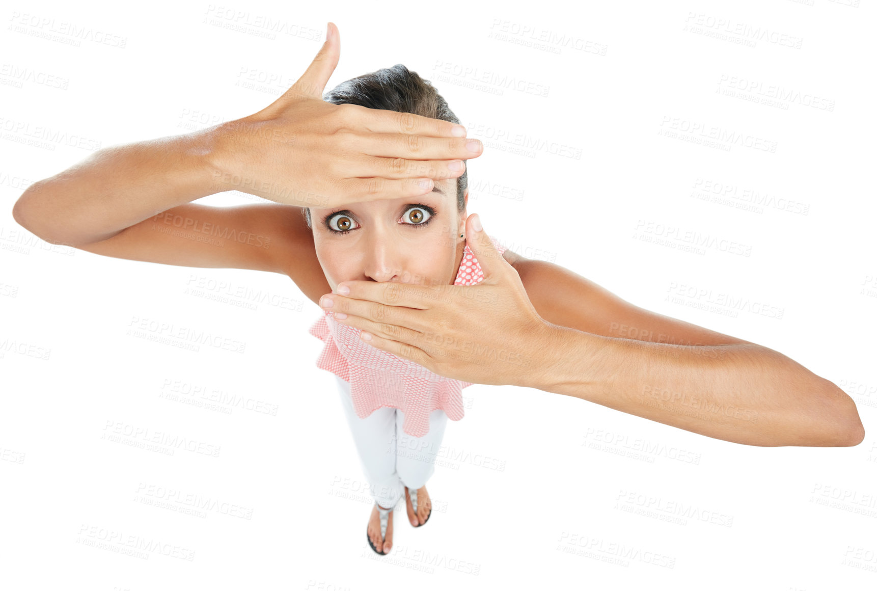 Buy stock photo Studio portrait of a young woman partially covering her face against a white background