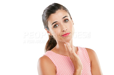 Buy stock photo Studio portrait of an attractive young woman posing against a white background