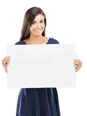 Buy stock photo Studio portrait of an attractive young woman holding a blank placard against a white background