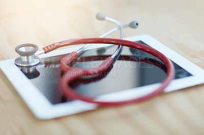 Buy stock photo Stethoscope, tablet and medical tools on desk in hospital office for consultation or checkup. Phonendoscope, digital technology and healthcare equipment for telehealth information or data in clinic.
