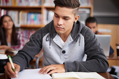 Buy stock photo Study, writing and college with man in classroom for education, library research and quiz. Focus, learning and notebook with male student on university campus for knowledge, scholarship and project