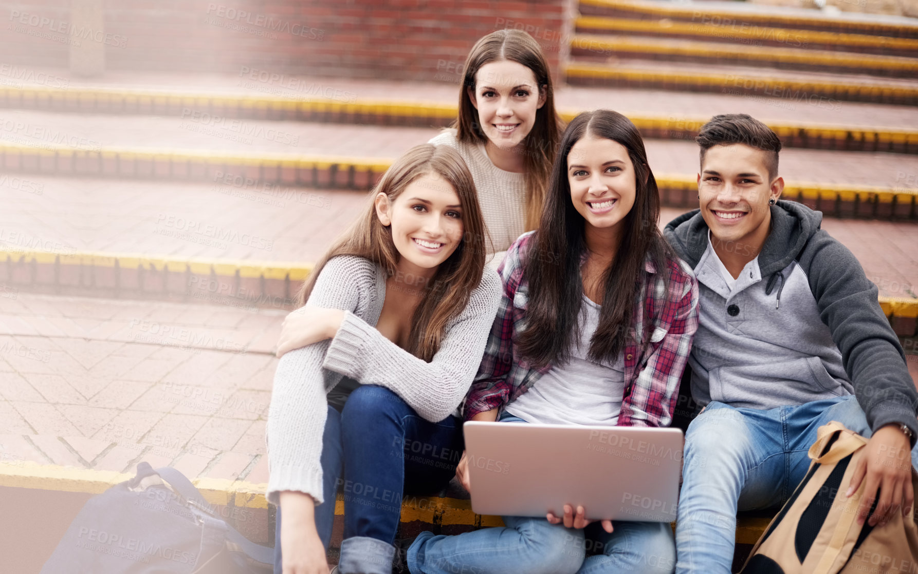 Buy stock photo Portrait of friends with laptop on campus steps, happiness and online education in college with diversity. Learning, studying and students at university with smile, internet and future opportunity.