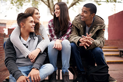 Buy stock photo University, education and friends on campus in conversation, talking and chatting outdoors. Diversity, community and happy men and women students smile for learning at school, academy and college
