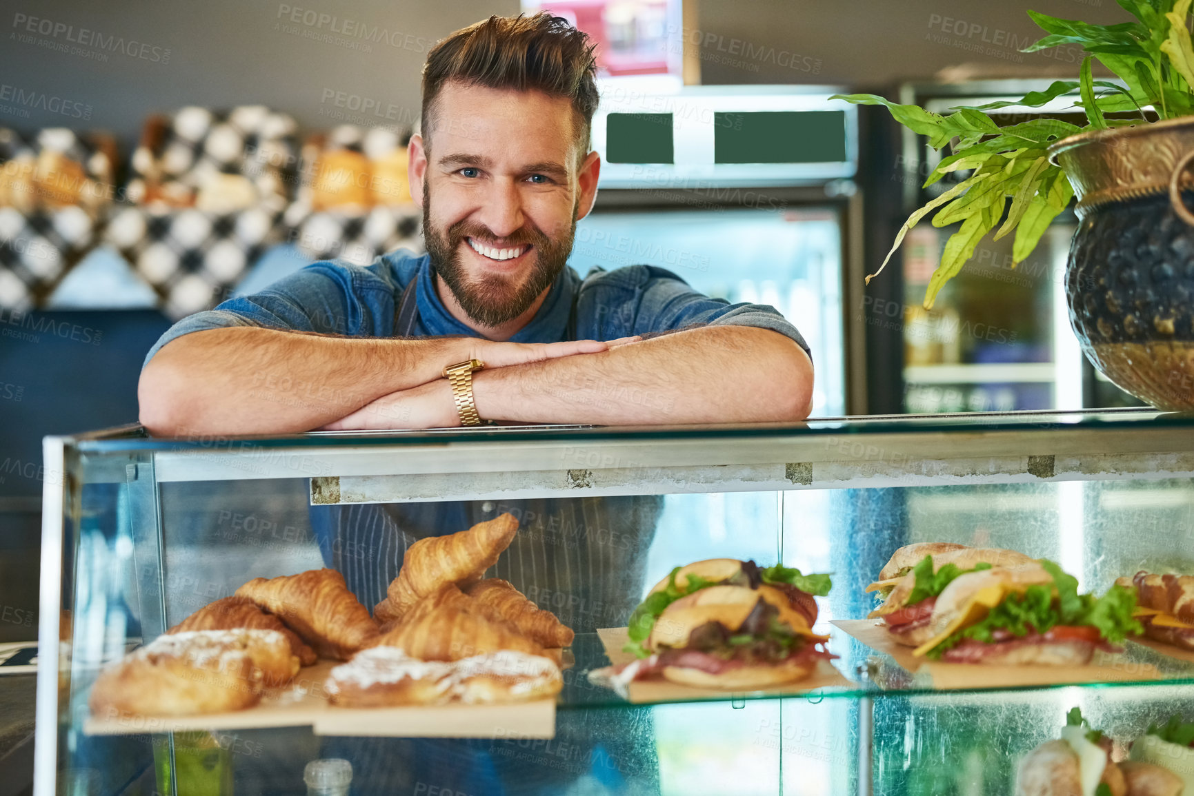 Buy stock photo Portrait of a proud business owner working in his store
