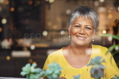 Buy stock photo Senior woman, smile and portrait in cafe with plant for calm, style and relax for retired and elderly in Amsterdam. Happy person or pensioner and sit in coffee shop for customer and unwind on mockup