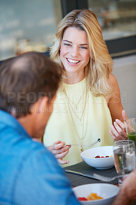 Buy stock photo Shot of a happy couple enjoying a healthy meal together at home
