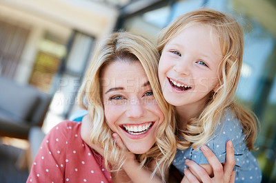 Buy stock photo Portrait of a mother and daughter spending quality time together outside