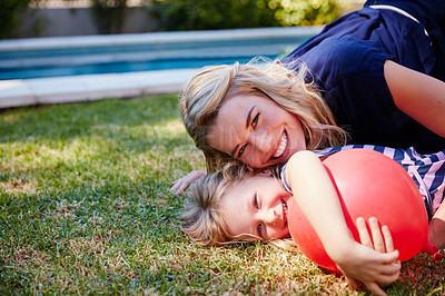 Buy stock photo Portrait of a mother and daughter enjoying a day outdoors together