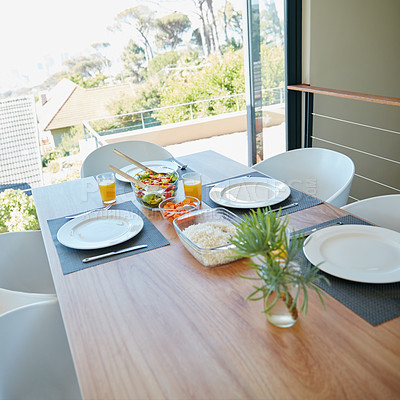 Buy stock photo Still life shot of a dining table set for a meal