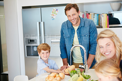 Buy stock photo Portrait of a happy family cooking together at home