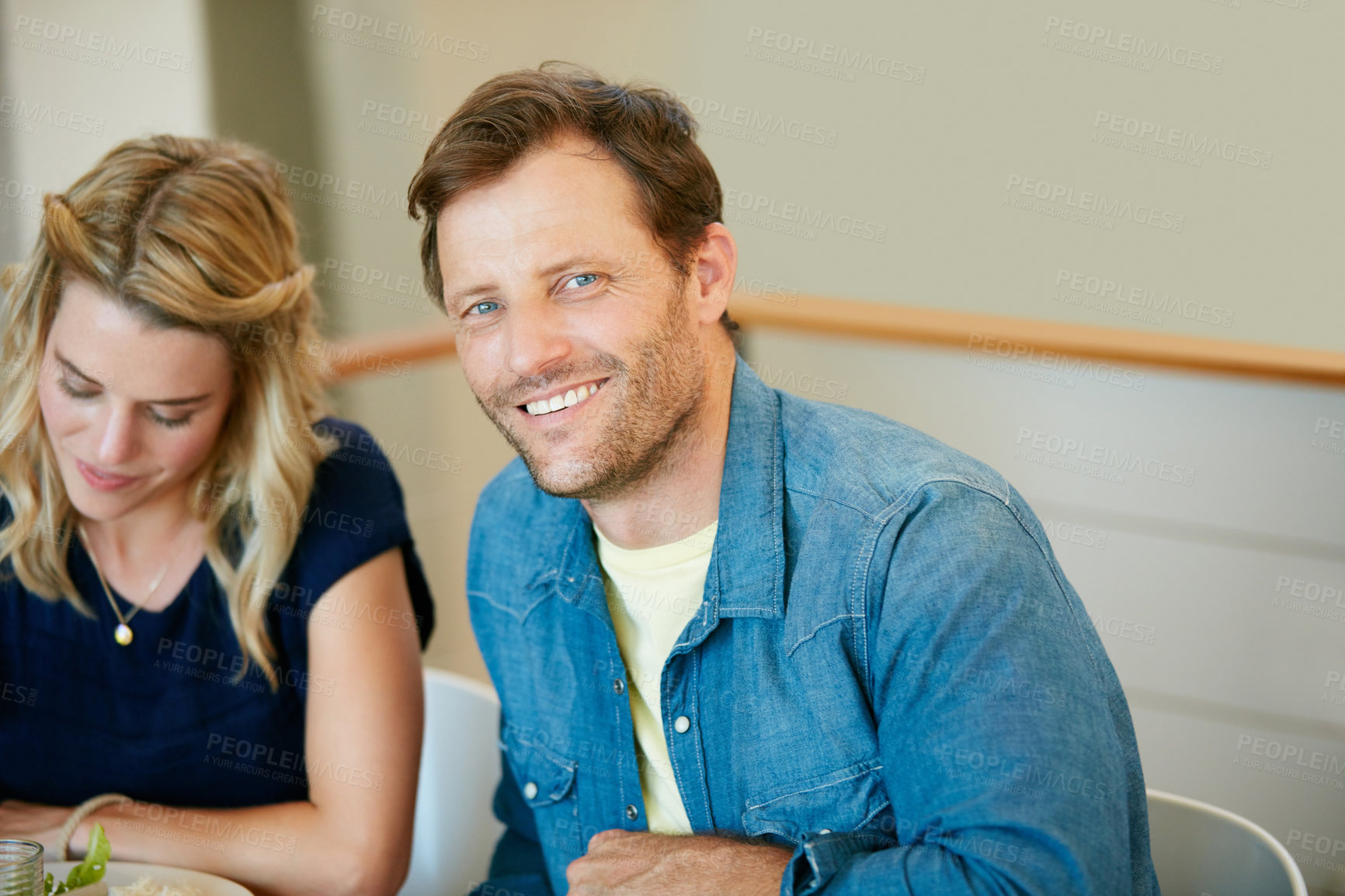 Buy stock photo Cropped shot of a couple enjoying a meal together at home