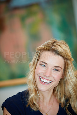 Buy stock photo Portrait of an attractive young woman enjoying her free time at home