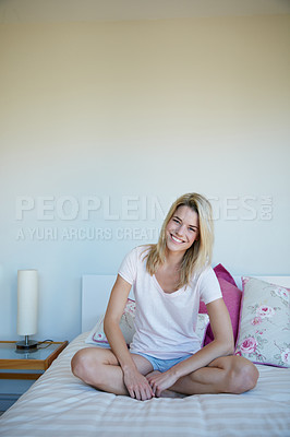 Buy stock photo Shot of a young woman relaxing at home