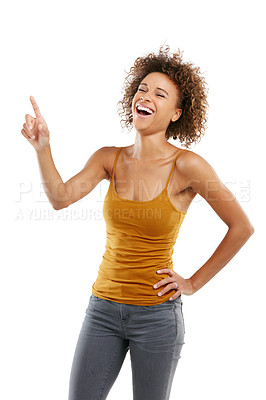 Buy stock photo Studio shot of an attractive young woman pointing towards something