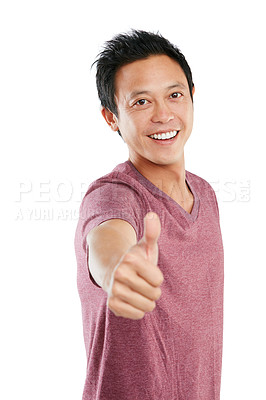 Buy stock photo Studio portrait of a young man standing and giving a thumbs up against a white background