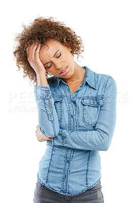 Buy stock photo Studio shot of a young woman experiencing a headache against a white background