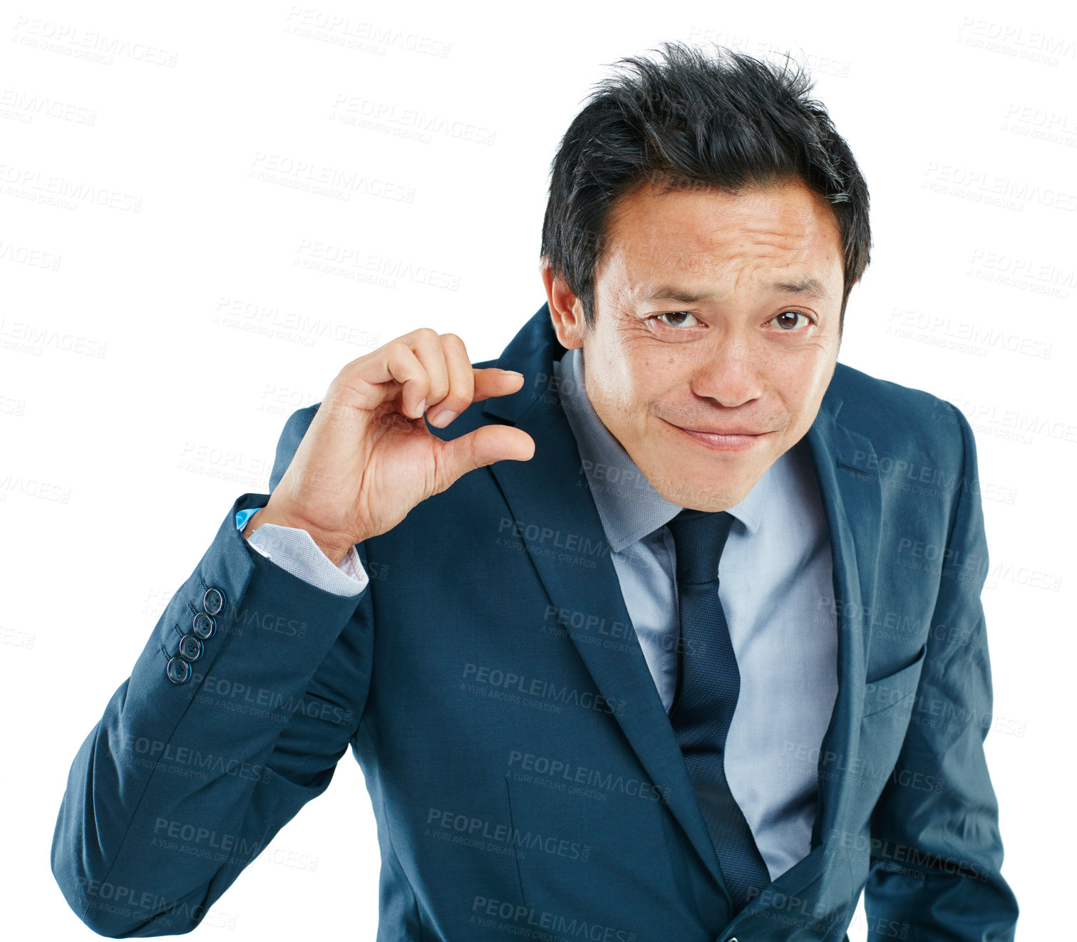 Buy stock photo Portrait, hand or small with a business asian man in studio isolated on a white background to measure size. Face, gesture or little and a male employee giving a review or feedback with a finger scale