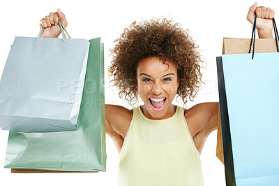 Buy stock photo Shopping, retail and black woman customer excited with sale or deal isolated against a studio white background. Portrait of happy, fashion and joyful winner celebrating holding bags at a giveaway 