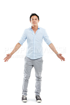 Buy stock photo Man, studio portrait and arms outstretch with fashion, sneakers and edgy jeans by white background. Isolated Asian model, hands open and palm stretching with trendy clothes, style shoes and aesthetic