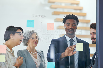 Buy stock photo People, brainstorming and sticky notes on glass for project, teamwork and strategy in office with diversity. Event managers, planning and meeting with moodboard for business, collaboration and idea