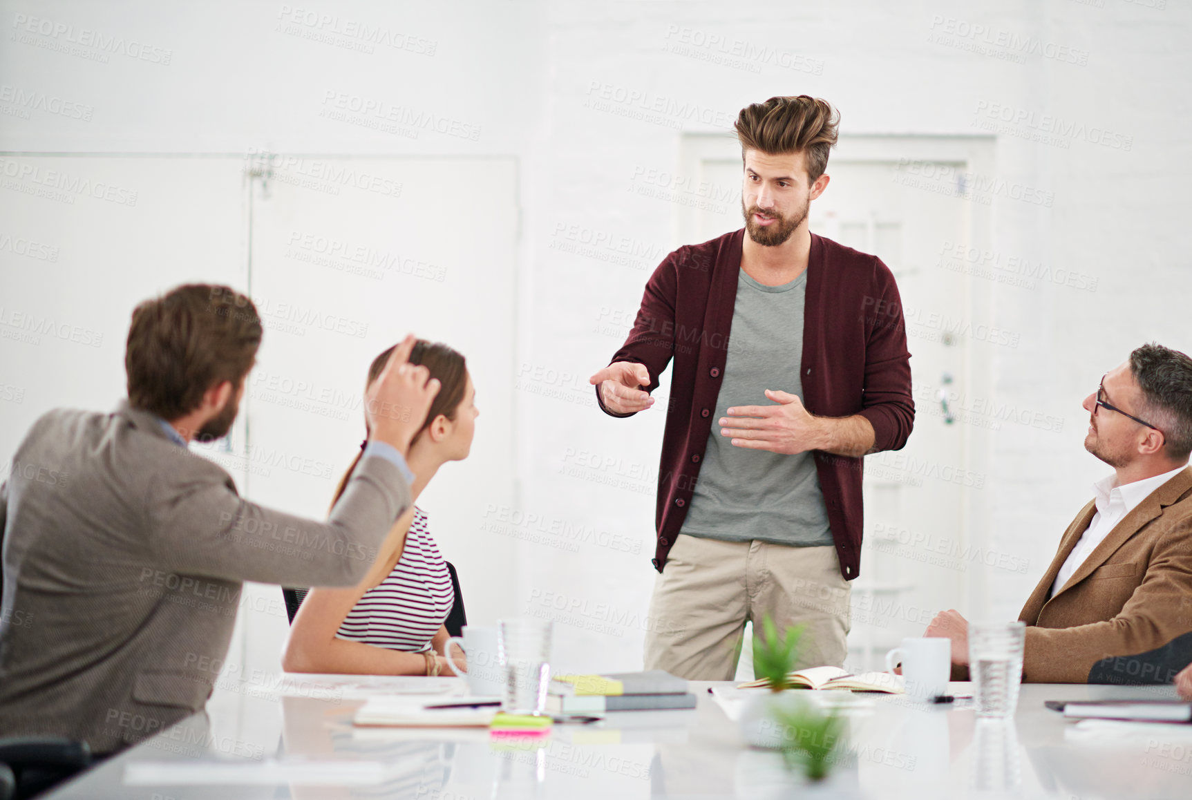 Buy stock photo Meeting, collaboration and business people in office for discussion on creative project together. Conversation, planning and professional designers working with teamwork in workplace boardroom.