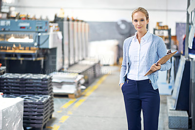 Buy stock photo Woman, clipboard and suit with confidence in warehouse or factory with production, paperwork and administration. Portrait, female person and stock or information capture in logistics company.