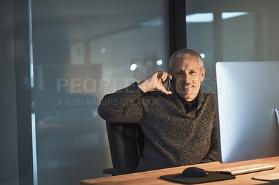 Buy stock photo Cropped portrait of a mature businessman working late at the office