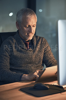 Buy stock photo Night, research and mature man with tablet reading website review, online report or article for business opportunity. Networking, communication and businessman at desk with digital app in dark office