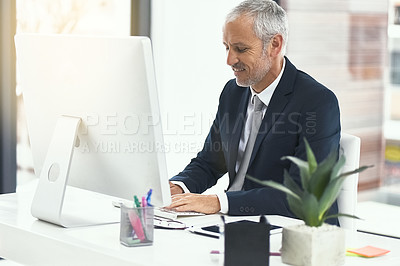 Buy stock photo Mature man, office and happy on computer for internet research, online and information as lawyer. Entrepreneur, pc and write email for connection, networking and legal advice or company growth