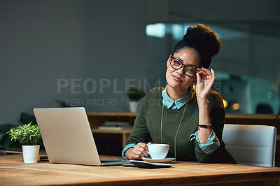 Buy stock photo Portrait of an attractive young woman working on her laptop in the office