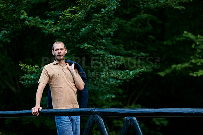 Buy stock photo Portrait of a handsome man standing outdoors