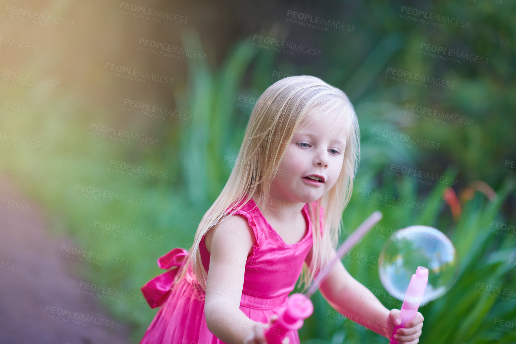 Buy stock photo Cropped shot of a cute little girl playing outside