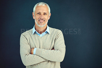 Buy stock photo Mature, man and portrait of happy professor in studio, blue background and education mockup. Smile, teacher and professional to lecture at university, academy or college with class in geometry