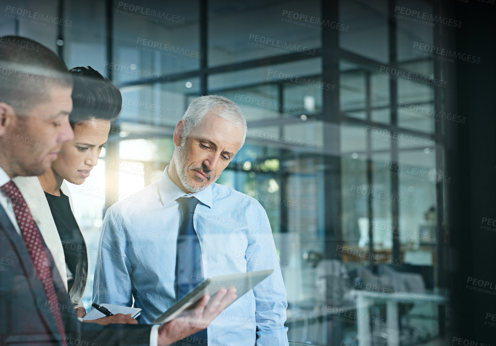 Buy stock photo Tablet, research and business people in office reading corporate finance information by window. Teamwork, planning and group of financial advisors working on digital technology by glass in workplace.