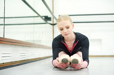 Buy stock photo Woman, ballet and stretching in studio for fitness, exercise and training for dancer for show. Young female ballerina, rehearsal and performance indoor at school of art for creative, artist and barre