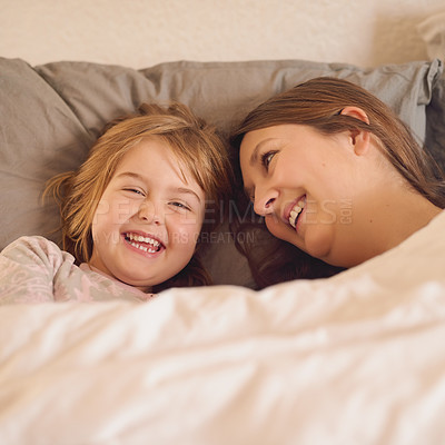 Buy stock photo Portrait, mother and child laughing in bedroom, bonding and happy family relax together at home. Face, funny and mom with girl in bed for connection, morning and healthy relationship with parent