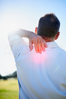 Buy stock photo Man, back pain and inflammation with injury in outdoor for muscle, healthcare and medicine with lens flare. Male person, discomfort and red in neck for golf, stress and strain in sports or activity