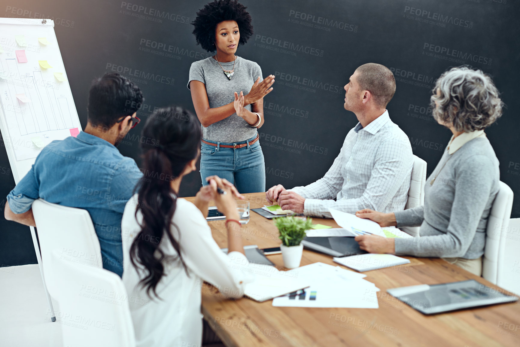 Buy stock photo Shot of a businesswoman giving a presentation in the boardroom