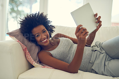 Buy stock photo Black woman, happy and portrait with tablet on sofa for entertainment, social media or internet blog. Technology, female person and smile with confidence in home for online sharing and connectivity