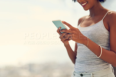 Buy stock photo Woman, typing and happy with smartphone replying to text for communication, social media post or internet blog. Technology, female person and smile with mobile for online sharing and connectivity