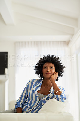 Buy stock photo Thinking, black woman and couch in home for relax, calm or living room on break. Ideas, vision and rest on sofa in lounge for female person with afro, daydreaming and holiday or weekend in house