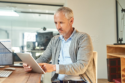 Buy stock photo Mature man, tablet and serious in office, CEO planning and check email at desk for project. Person, entrepreneur and owner of finance firm at workplace, accounting app and website for economy update
