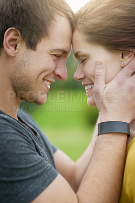 Buy stock photo Couple, forehead and hug with love outdoor for passion or care, affection and bonding on weekend getaway or vacation. Man, woman and together for security or safety, romance and happiness in nature.