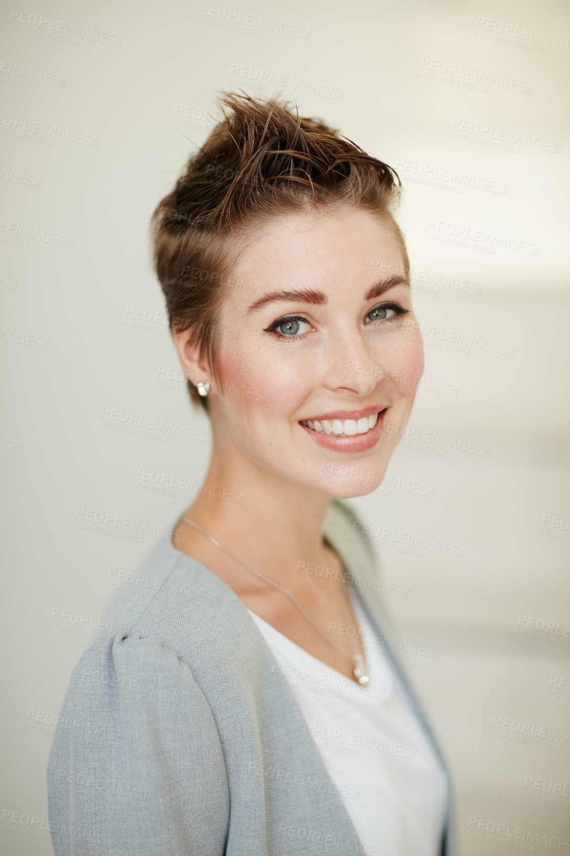 Buy stock photo Portrait of a young businesswoman standing in an office