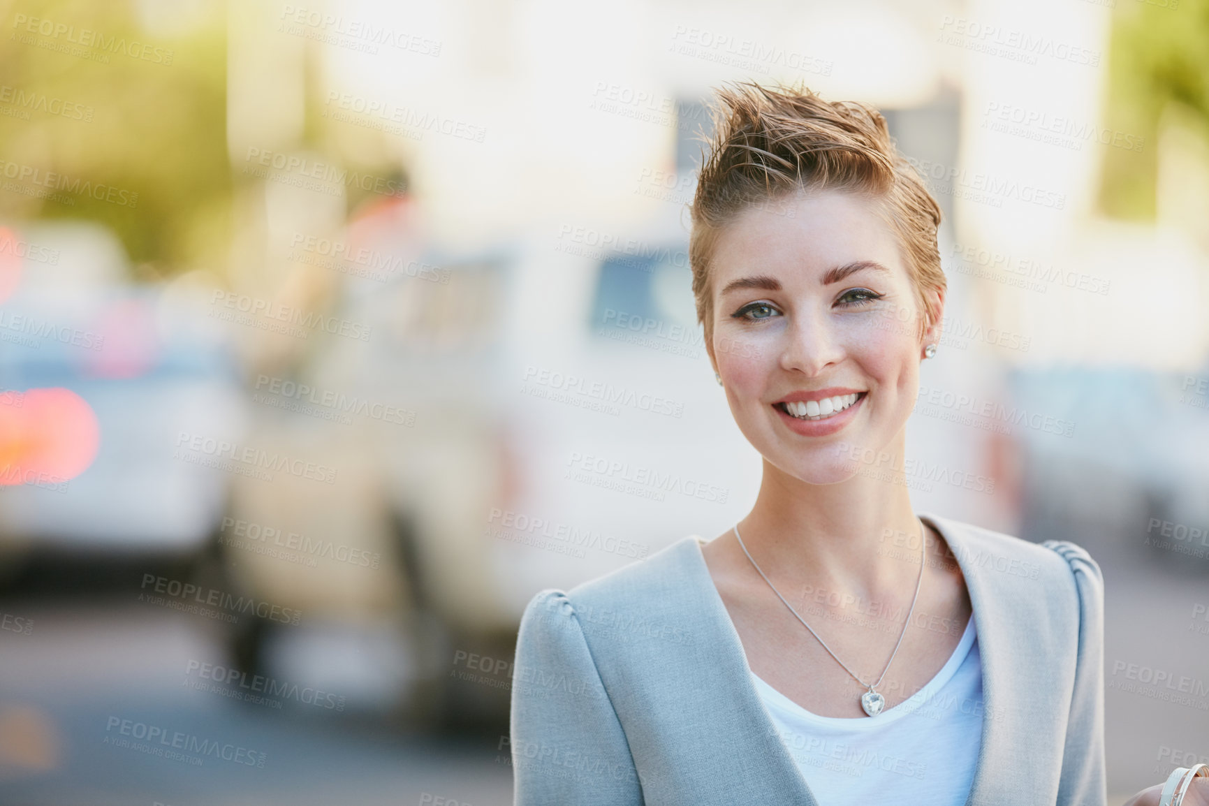 Buy stock photo Portrait of a young businesswoman on the move in the city