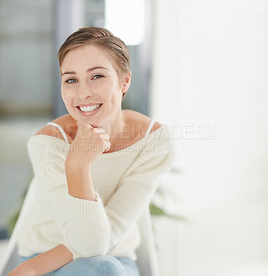 Buy stock photo Portrait of a smiling young woman alone at home