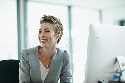 Buy stock photo Cropped shot of a young businesswoman working in an office
